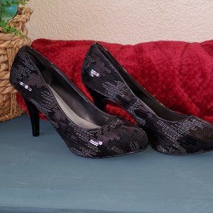 Black sequin pumps by Maurices
